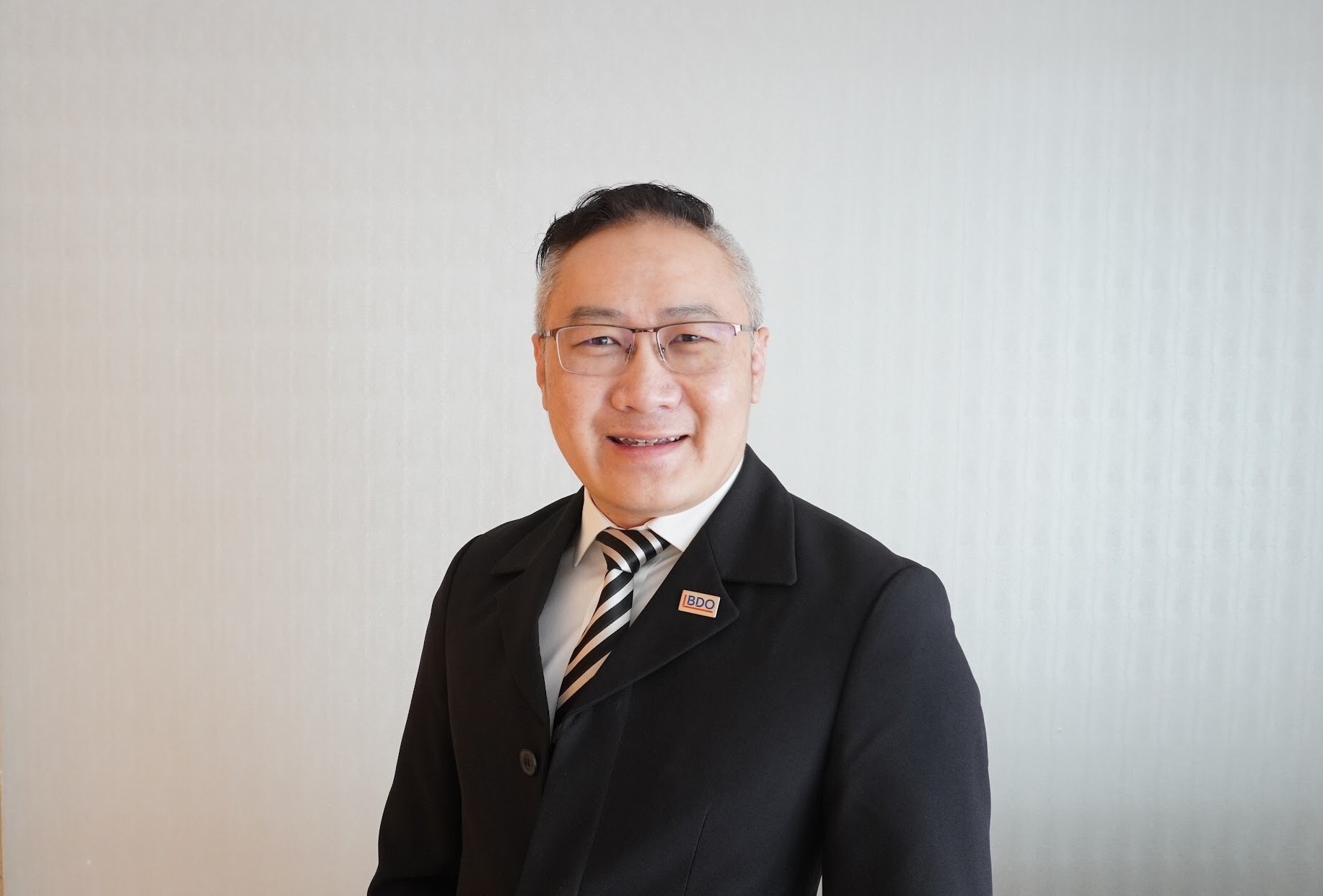 Raymond Lim Khoon Seng , Executive Director, Advisory